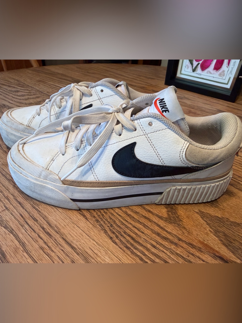 Nike Women’s White Leather platform Sneakers with Black Swoosh